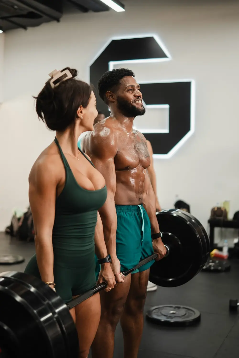 Barbell work during a BUILD class at GRIT